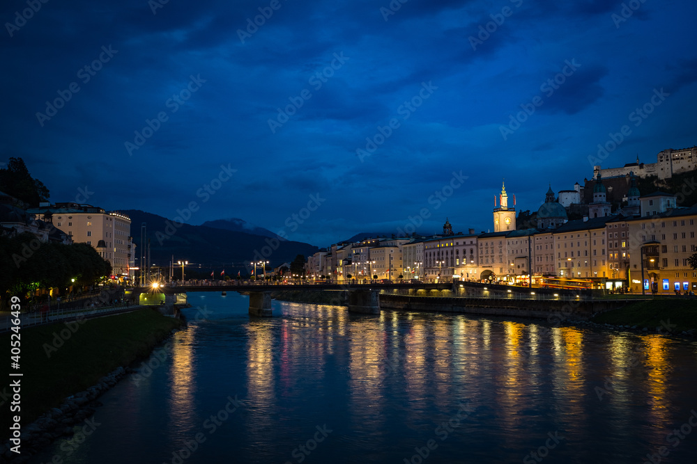 Salzburg Austria at nite along the banks of the Salzach river
