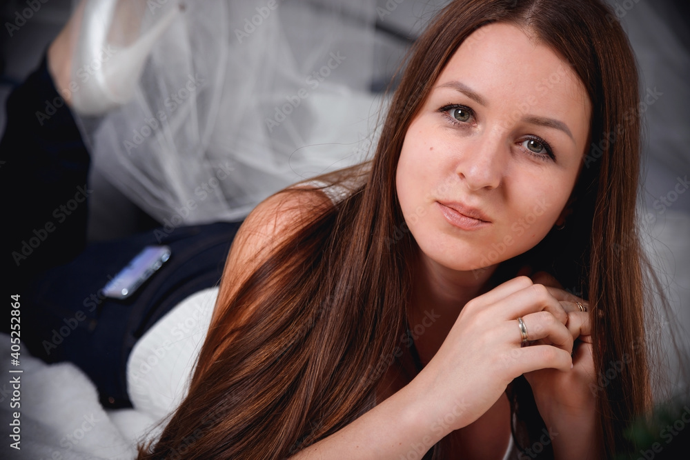 Fototapeta premium Portrait of a beautiful girl with long hair.
