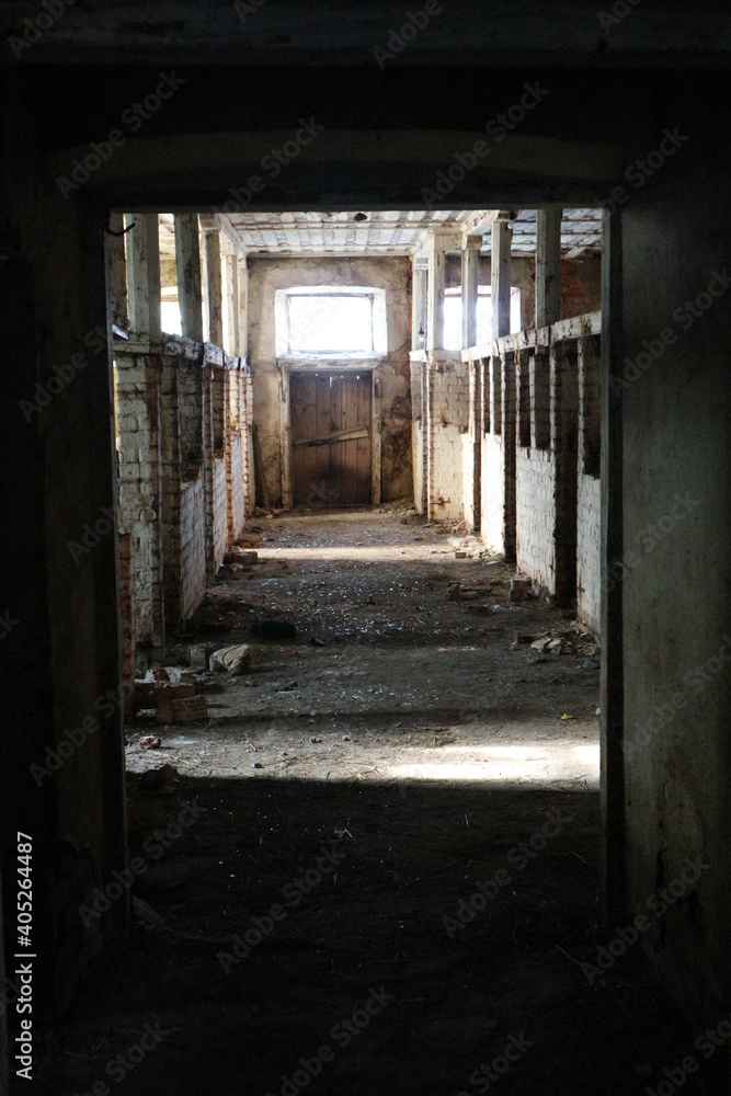 interior of old dirty abandoned stable