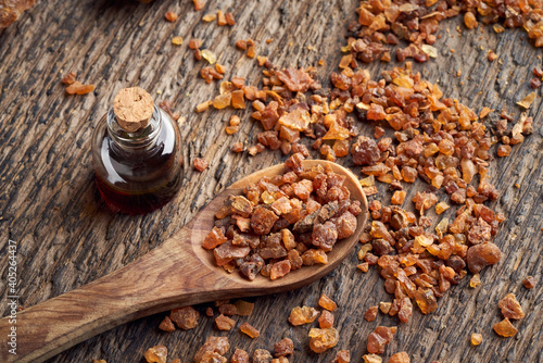 Fotografie, Obraz Myrrh resin with myrrh essential oil