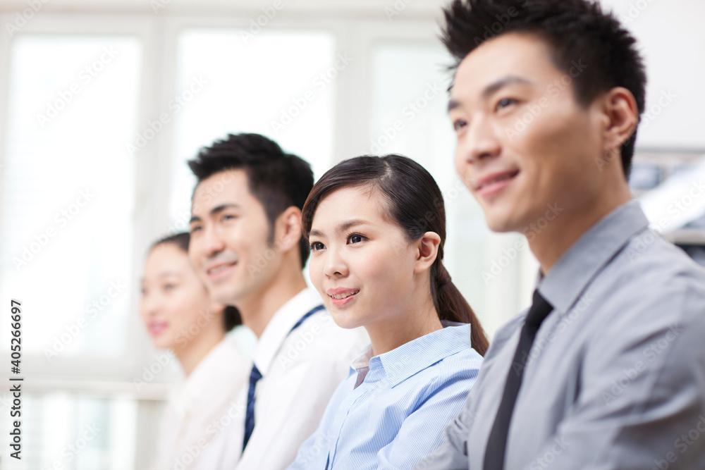 Group of business people sitting at conference table Group of business people sitting at conference table