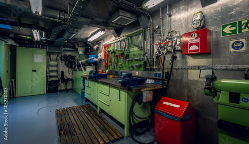 green workshop shop floor machine in factory or ship under deck 