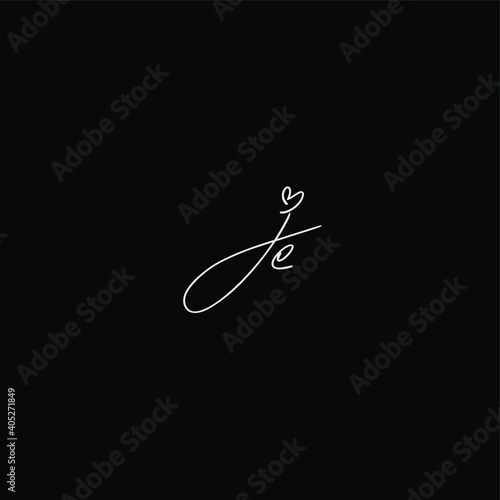 je initial handwriting black background