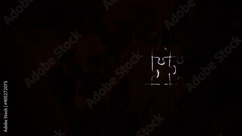 puzzle pieces outline silhouette light movement puzzling situation single piece lit moving fade to black