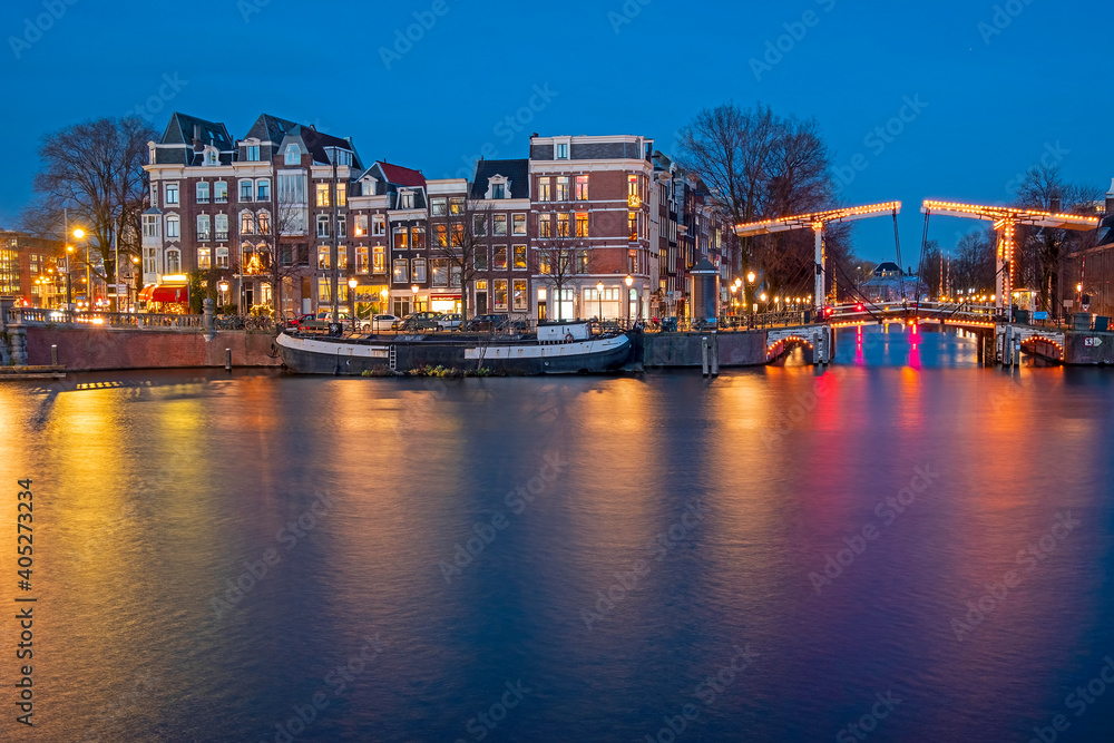 City scenic from Amsterdam by night in the Netherlands