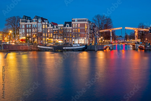 City scenic from Amsterdam by night in the Netherlands