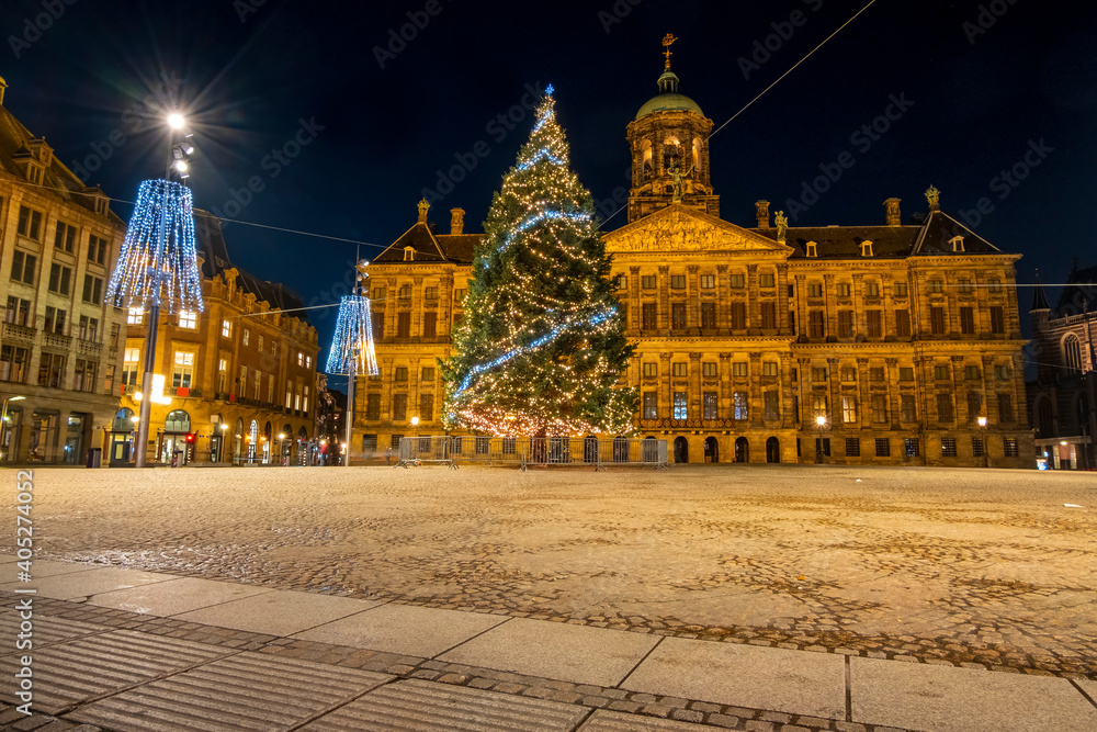Christmas on the Dam square in Amsterdam at night in the Netherlands