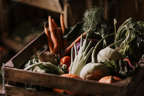 Close-up of fresh and organic vegetables in box photo