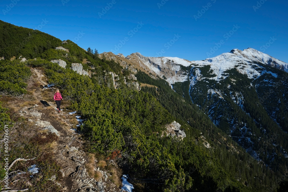 Senior woman hiking in Karwendel mountains Senior woman hiking in Karwendel mountains