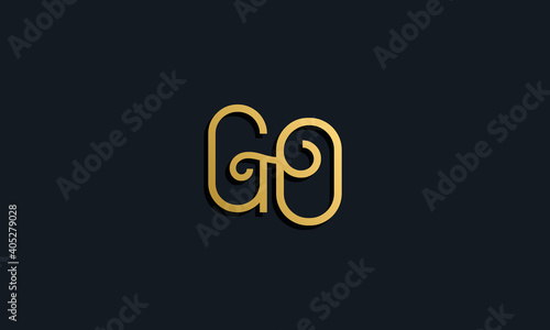 Luxury fashion initial letter GO logo.