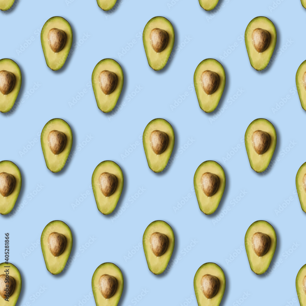 Avocado pattern on light blue background. Green avocadoes, minimal flat lay style. seamless pattern. Avocado pattern on light blue background. Green avocadoes, minimal flat lay style. seamless pattern.