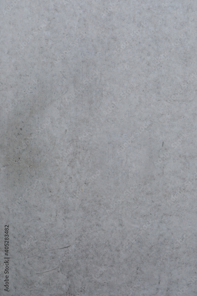 Grey concrete wall, even stone wall for background and template, no person and space for text Grey concrete wall, even stone wall for background and template, no person and space for text