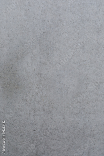 Grey concrete wall, even stone wall for background and template, no person and space for text