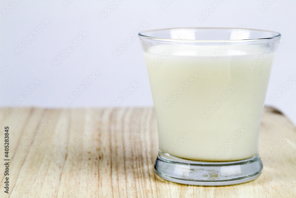 Little glass of milk on the table Little glass of milk on the table