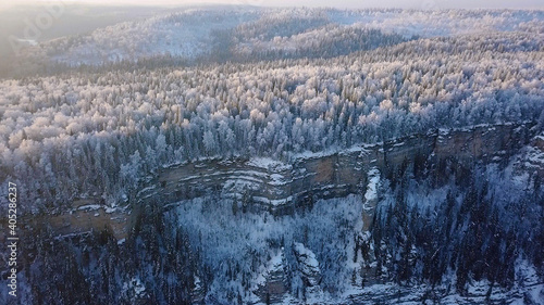 Snow-covered Russian forest, Mount Gubakha, Perm. Aerial panoramic view of russian nature. View from the Drone	
 photo