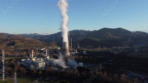Wallpaper Mural Thermal power plant at full production generating energy. A huge column of polluting vapor is expelled into the environment. Non-renewable energy concept Torontodigital.ca