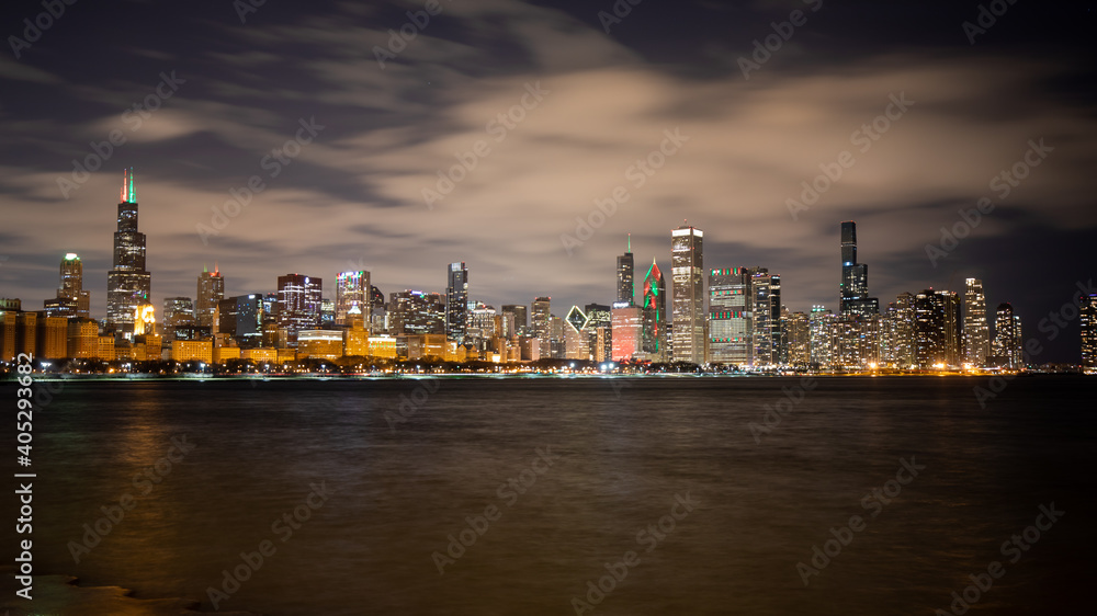 Chicago skyline at night during Christmas. View from Adler Planetarium.