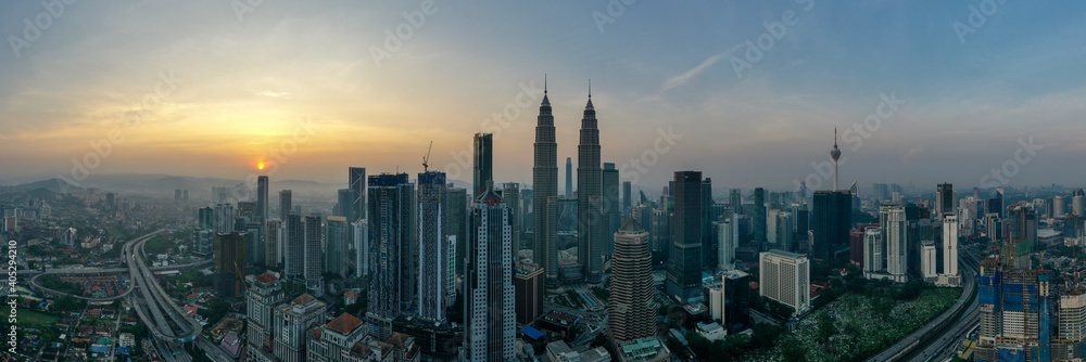 Aerial View Of City Buildings During Sunset