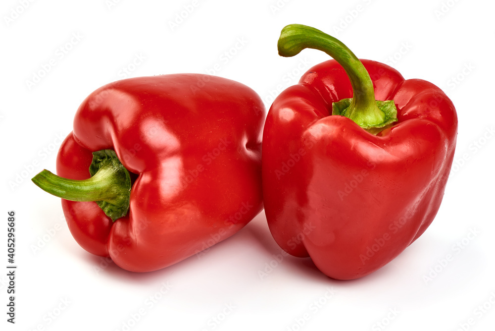 Red ripe bell peppers, isolated on white background