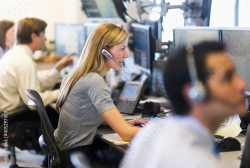 Traders at trading desk photo