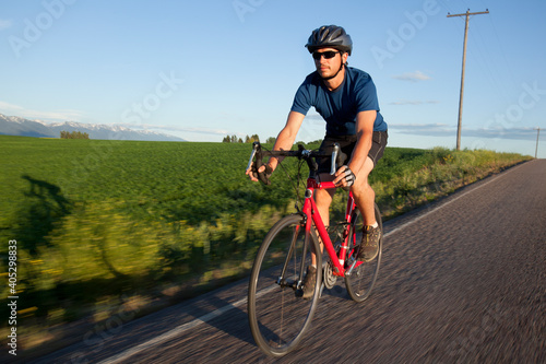 USA, Montana, Kalispell, Cyclist captured in motion photo