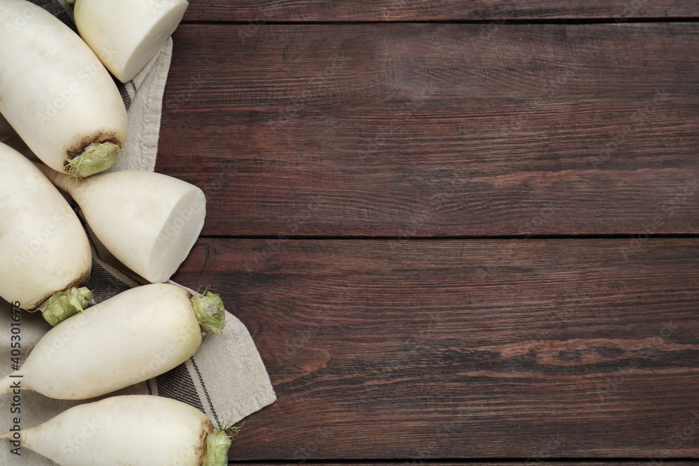 White turnips on wooden table, flat lay. Space for text White turnips on wooden table, flat lay. Space for text