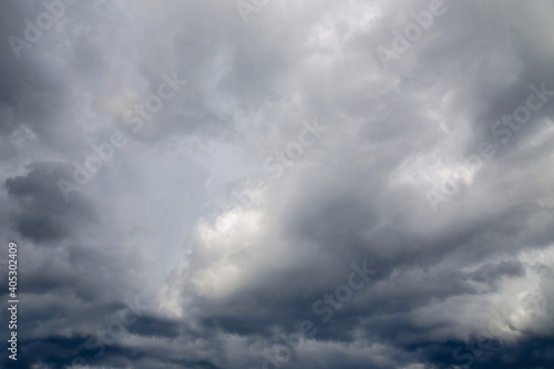 Aerial clouds against the background of a cloudy, winter sky.