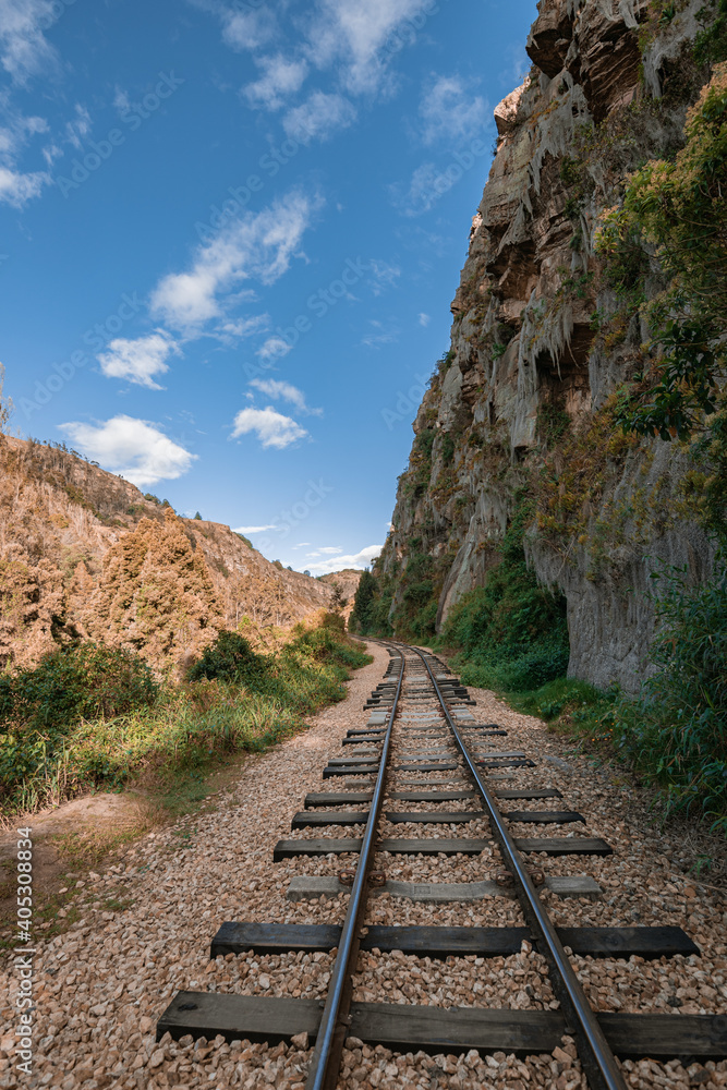 Old Railway with rocky mountains and stone walls on a sunny day in Suesca, Cundinamarca - Colombia Old Railway with rocky mountains and stone walls on a sunny day in Suesca, Cundinamarca - Colombia