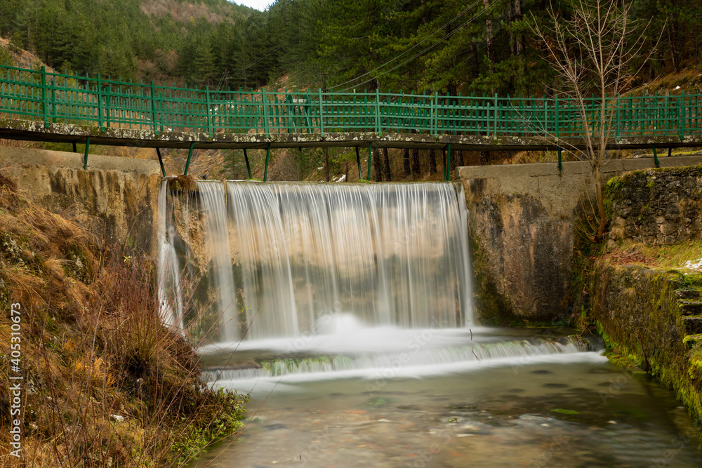 Small dam with waterfall in Park Small dam with waterfall in Park