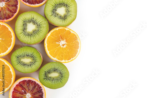 set of fruits with vitamin c  kiwi  lelon  red orange  yellow orange in a cut isolate on white