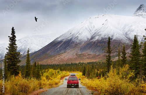 Recreational vehicle on rural road, Wrangell St. Elias, Alaska, USA photo