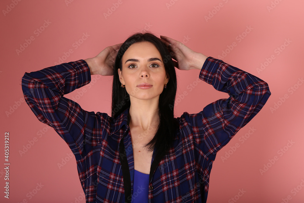 Beautiful brunette woman on pink background Beautiful brunette woman on pink background