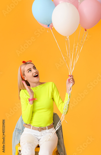 Happy young woman with air ...