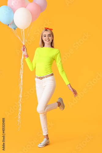Happy young woman with air ...