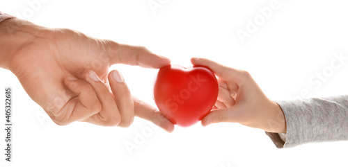 Hands of family with heart isolated on white background