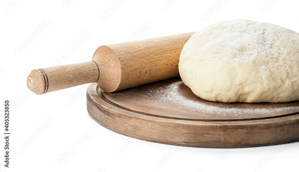Fresh dough and rolling pin on white background Fresh dough and rolling pin on white background