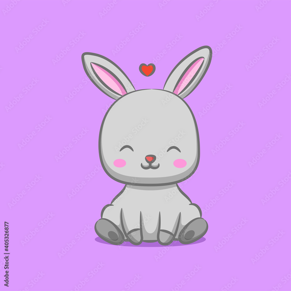 Fototapeta premium The rabbit with the long ears is sitting under the love sign