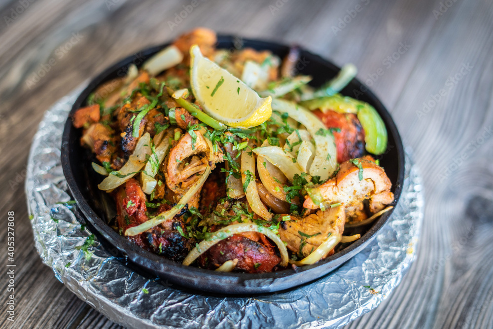 Indian kebab platter in sizzling plate Indian kebab platter in sizzling plate