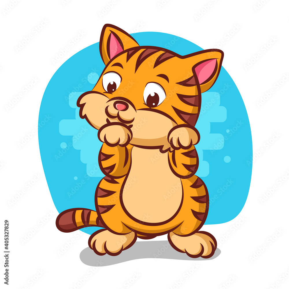 The cat with the cute pattern is lifting her pawns The cat with the cute pattern is lifting her pawns