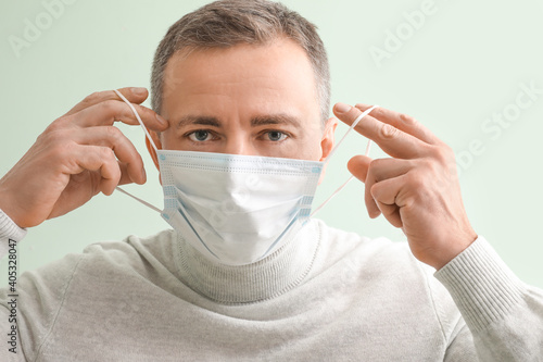 Mature man wearing medical ...