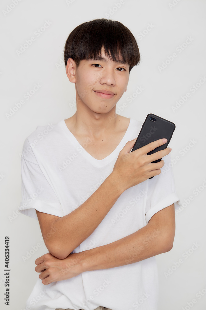 Asian Man holding of mobile phone Asian Man holding of mobile phone