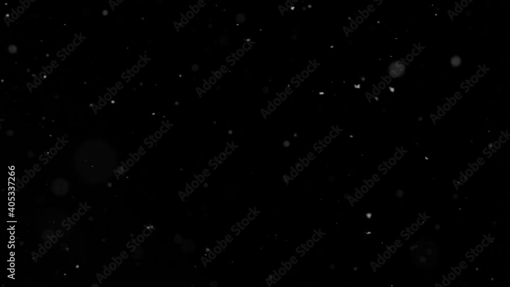 Super slow motion of natural snow falling on black background. Filmed on high speed cinema camera, 1000fps. Super slow motion of natural snow falling on black background. Filmed on high speed cinema camera, 1000fps.