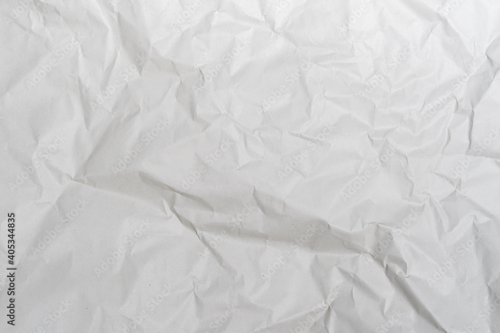Crumpled white paper texture perfect for background structure. Packaging material with rough wrinkles. The grunge textured surface is a vintage backdrop. Crumpled white paper texture perfect for background structure. Packaging material with rough wrinkles. The grunge textured surface is a vintage backdrop.