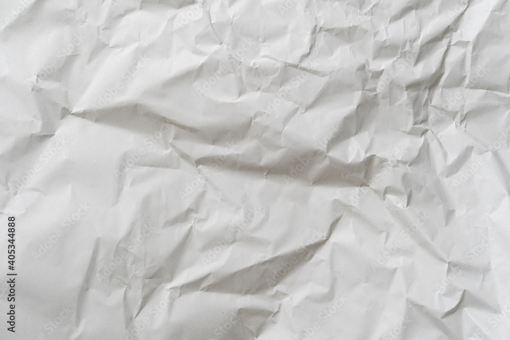 Crumpled white paper texture perfect for background structure. Packaging material with rough wrinkles. The grunge textured surface is a vintage backdrop. Crumpled white paper texture perfect for background structure. Packaging material with rough wrinkles. The grunge textured surface is a vintage backdrop.