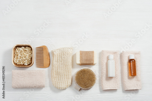 Bath accessories from natural material, zero waste set for bathroom, small bottles with gel and shampoo, soap, sea salt, washcloth