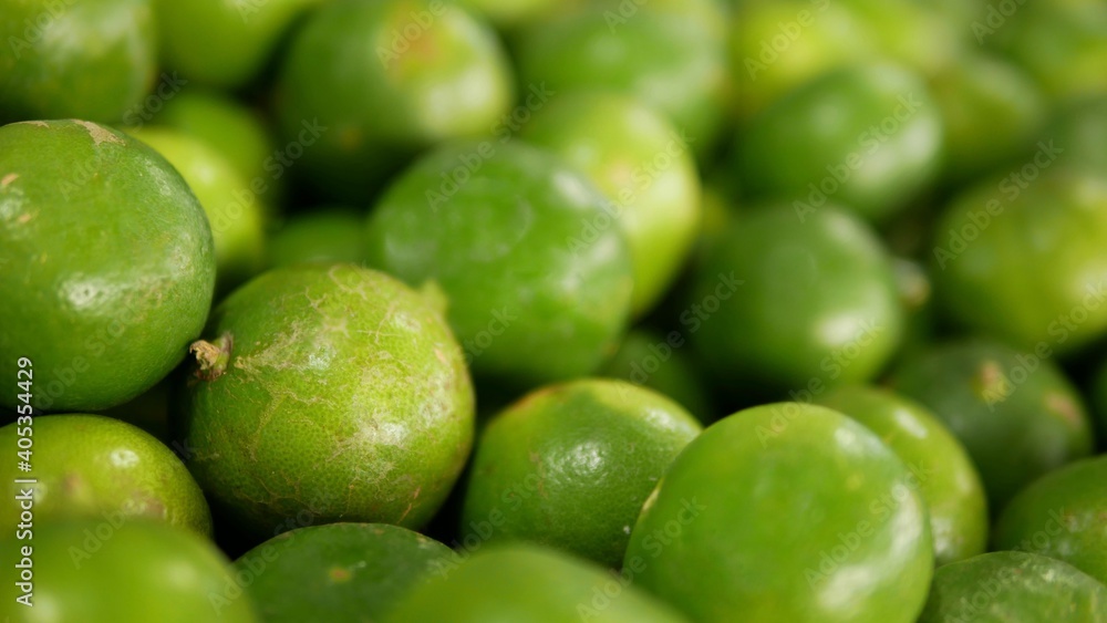 Background from fresh lime, blurry lime in market, Nature food Background from fresh lime, blurry lime in market, Nature food