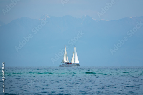 yacht with sails at sea