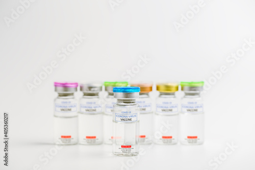 Ampoules with Covid-19 vaccine or Corona Virus 2019-ncov for injection on medical pharmaceutical. Coronavirus cure manufacture.