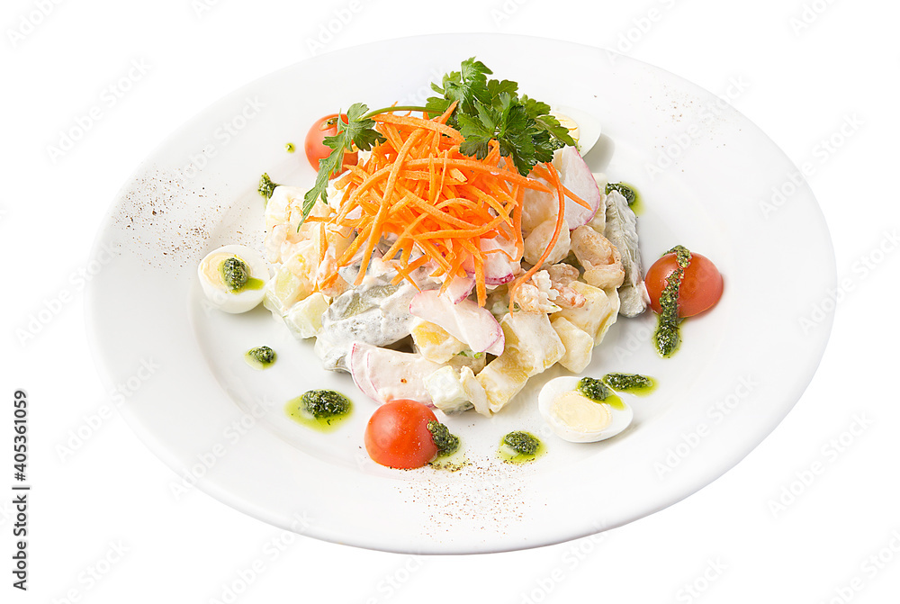 Light and delicate salad on a white plate. Restaurant serving concept. Isolated.