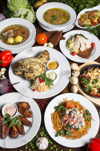 Richly set festive table. Abundance concept. Restaurant serving. Still life.